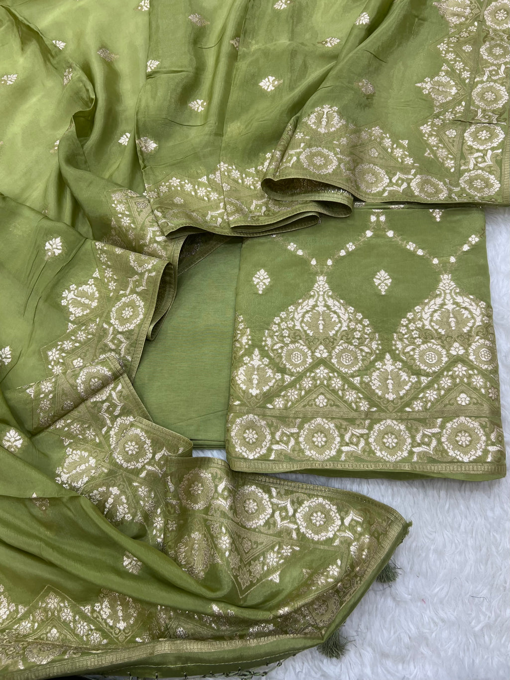 Pure crape antique almond zari weaved unstitched suits collections