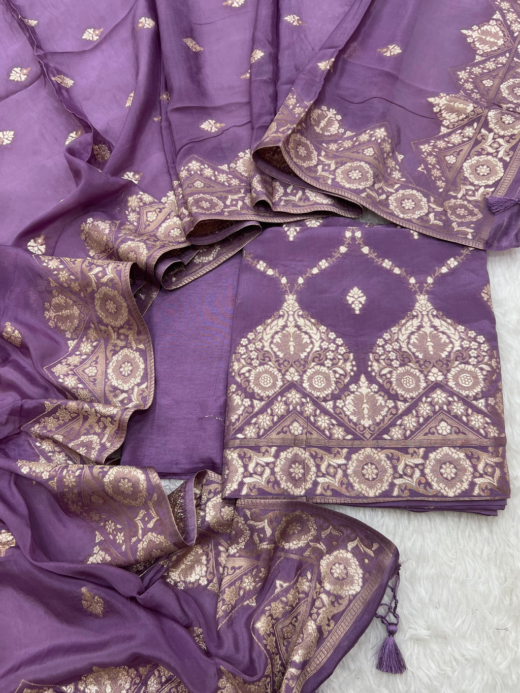 Pure crape antique almond zari weaved unstitched suits collections