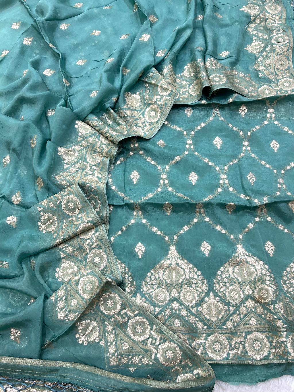 Pure crape antique almond zari weaved unstitched suits collections