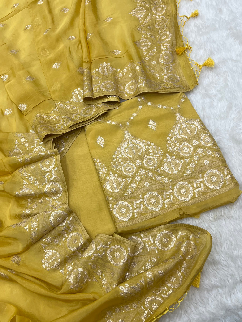 Pure crape antique almond zari weaved unstitched suits collections