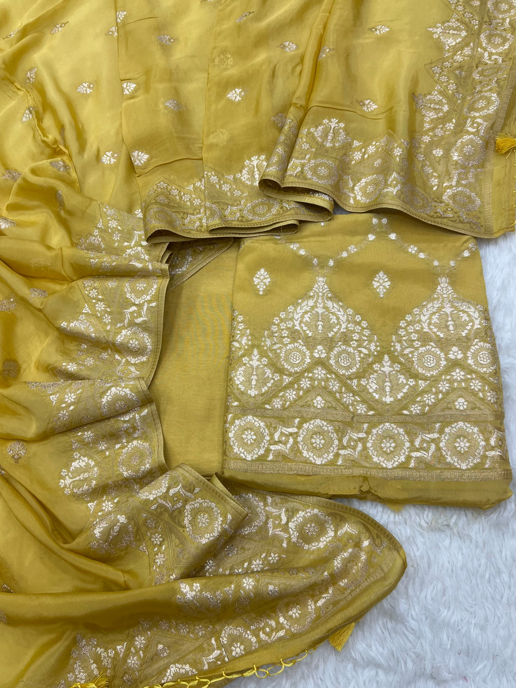 Pure crape antique almond zari weaved unstitched suits collections
