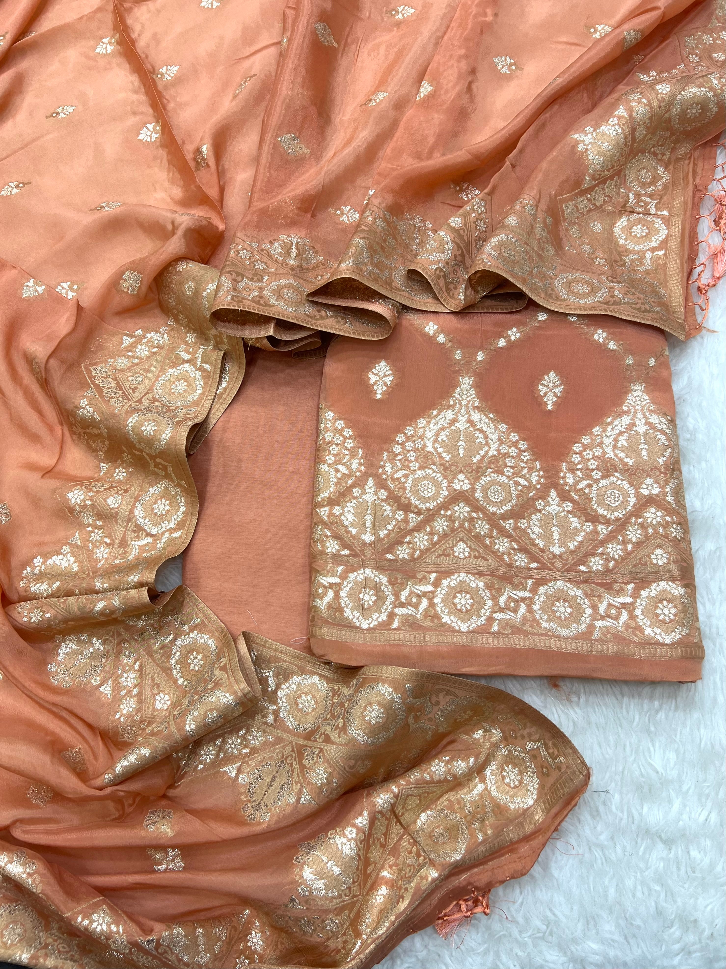 Pure crape antique almond zari weaved unstitched suits collections