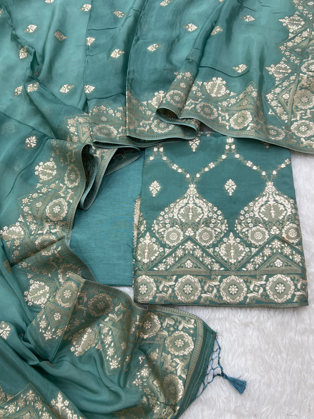 Pure crape antique almond zari weaved unstitched suits collections